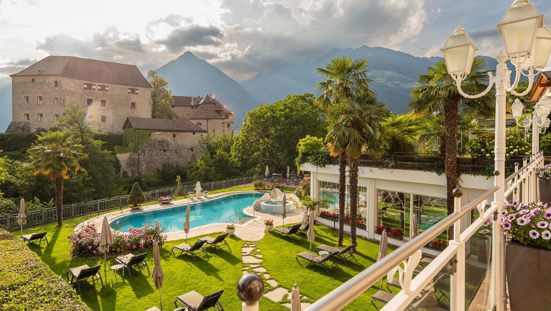 View on the outdoor pool, the mountains, and the castle